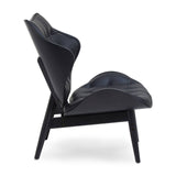 Stylish black leather effect chair featuring a unique curved design with tufted upholstery and a sturdy elm wood frame.
