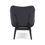 Stylish black leather effect chair featuring a curved backrest and sleek wooden legs, showcasing a modern design.