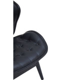 Black leather effect chair featuring a tufted seat and backrest, with a smooth, rounded design. The chair is supported by sleek, tapered legs, providing a modern aesthetic.