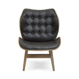 Stylish black leather effect chair featuring a button-tufted design and a curved backrest, supported by a sturdy elm wood frame with a natural finish.
