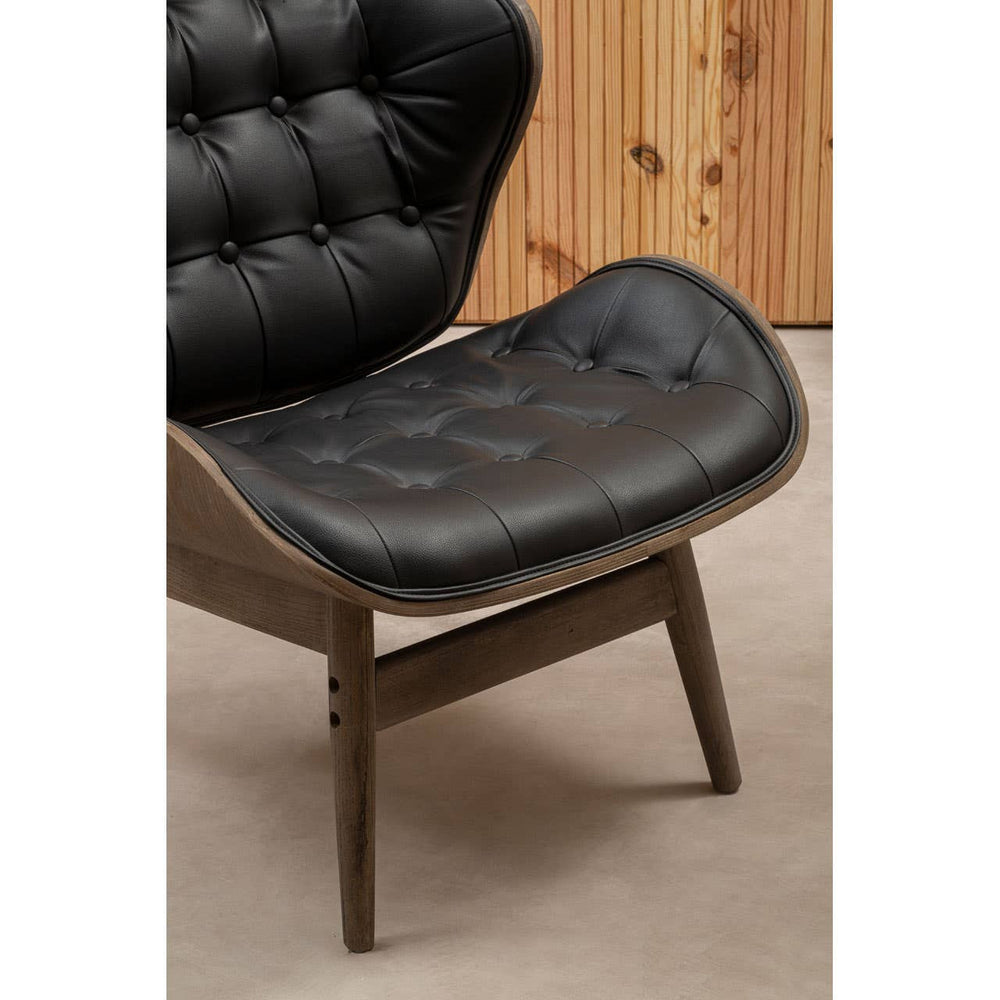 Black leather effect chair featuring a tufted design with button detailing, supported by a sturdy elm wood frame.