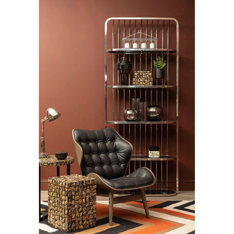 Stylish black leather effect chair featuring distinctive button detailing, set against a warm brown wall.
