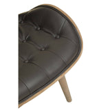 Stylish black leather effect chair featuring a tufted design with button detailing, complemented by a natural wood frame and tapered legs.