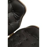 Stylish black leather effect chair featuring a tufted design with button detailing, showcasing a sleek silhouette and a warm elm wood frame.