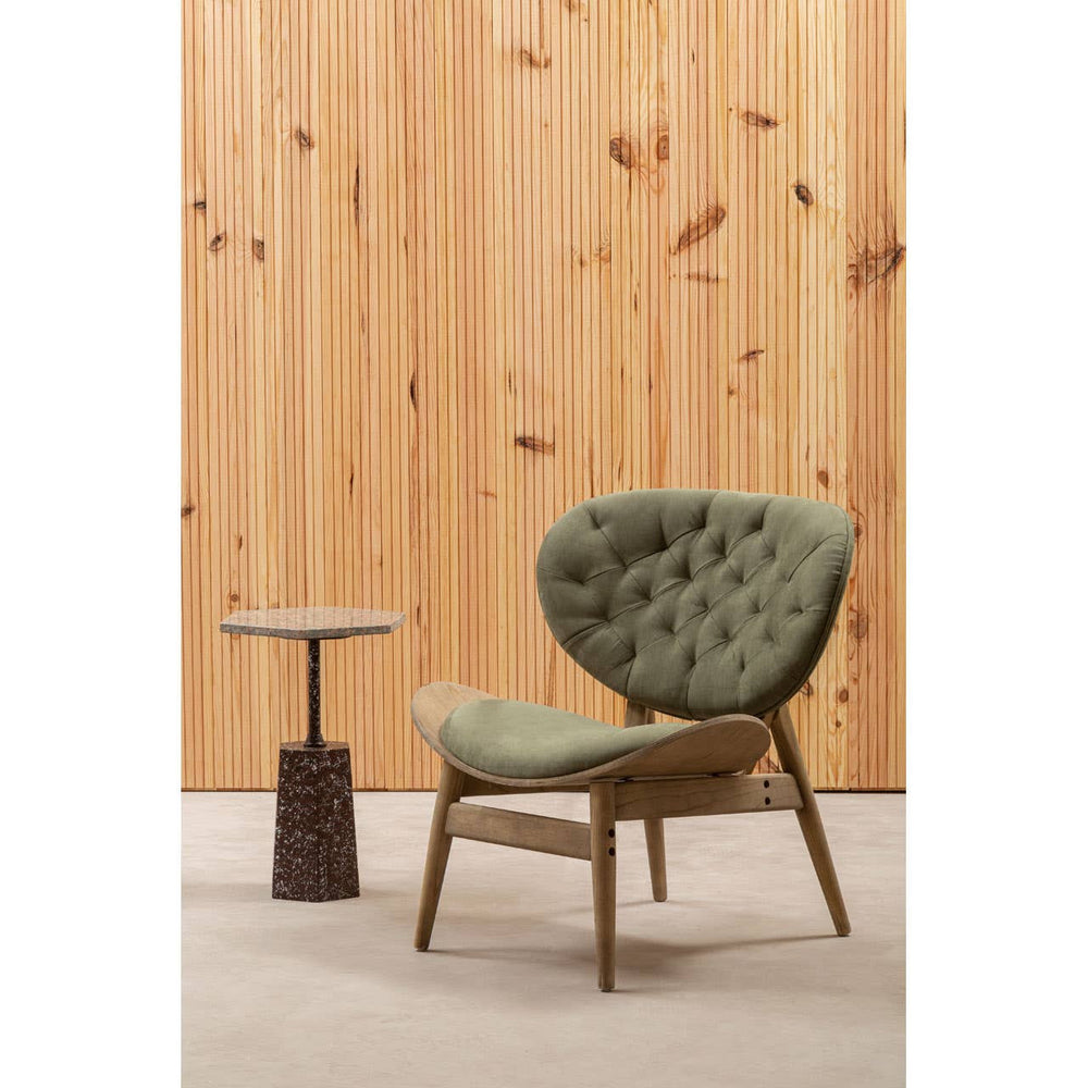 Green velvet chair featuring a tufted backrest and a comfortable seat, supported by a grey elm wood frame.