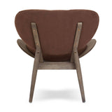 Brown velvet chair featuring a rounded backrest and dark elm wood frame, showcasing a sleek design with visible copper accents on the backrest.