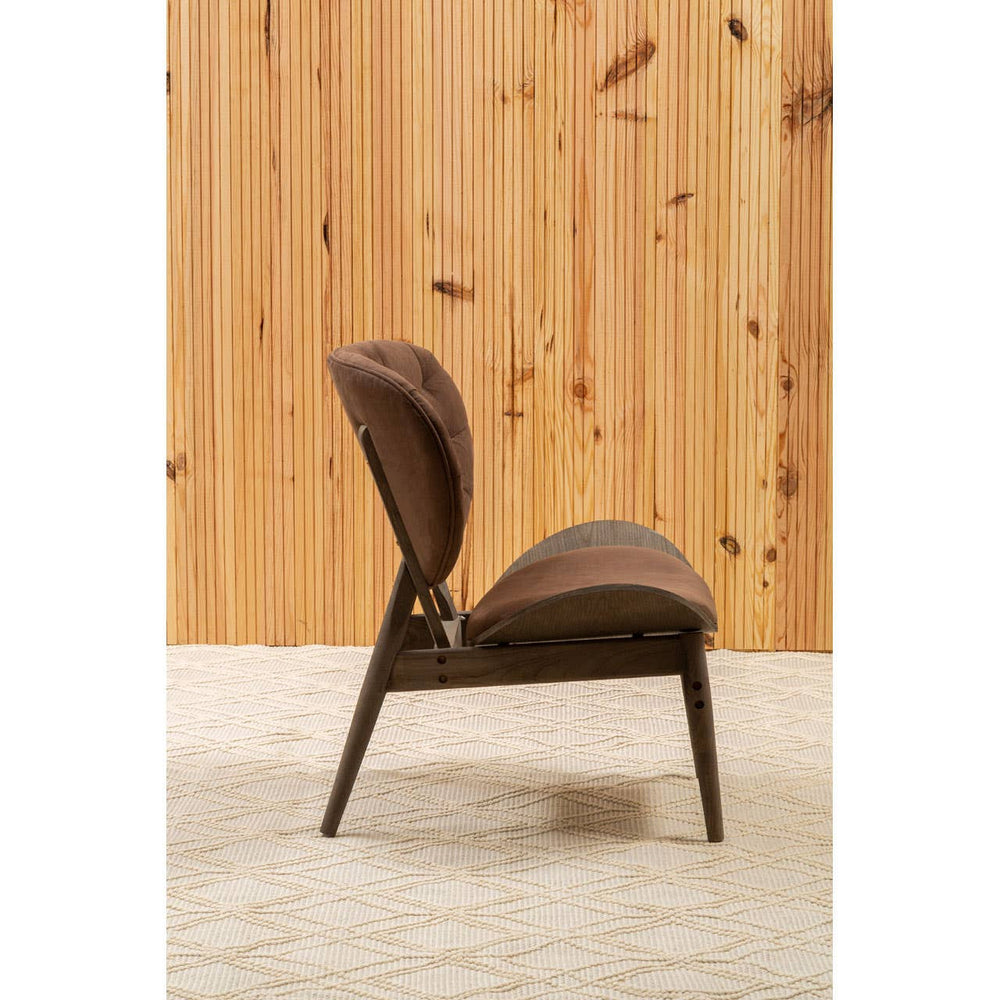 Brown velvet chair featuring a dark elm wood frame, showcasing a curved backrest and plush seating.