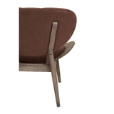 Brown velvet chair featuring a rounded backrest and a dark elm wood frame. The chair's legs are angled for stability, and the upholstery has a soft texture.