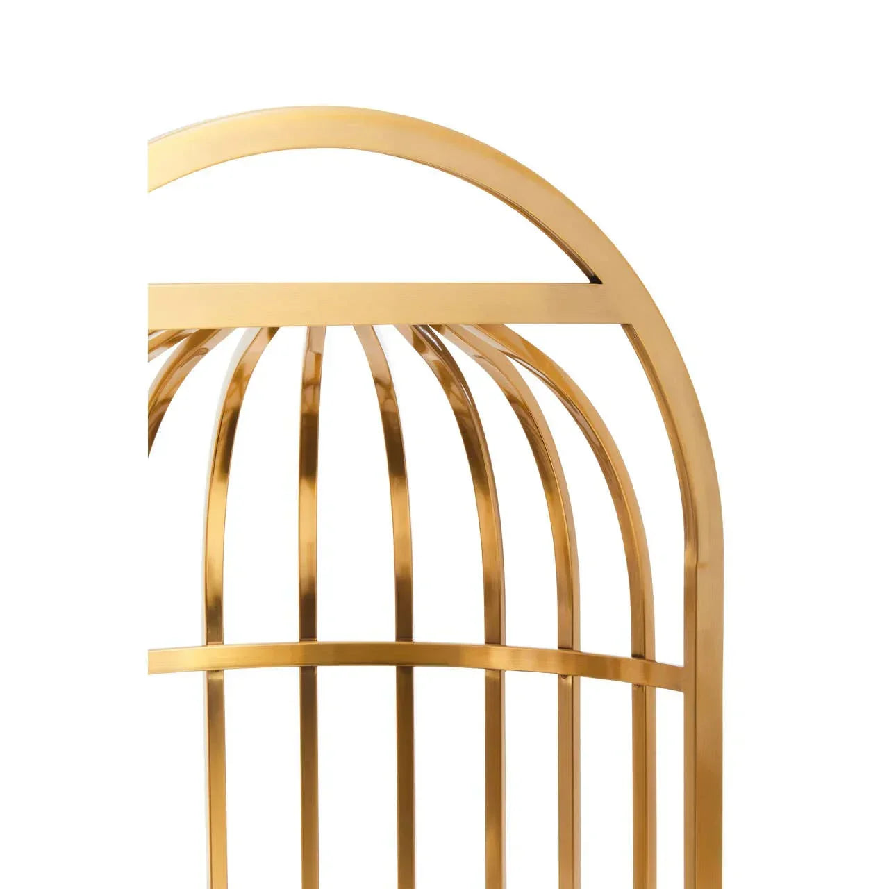 Close-up of gold metal furniture frame with curved arch and vertical bars