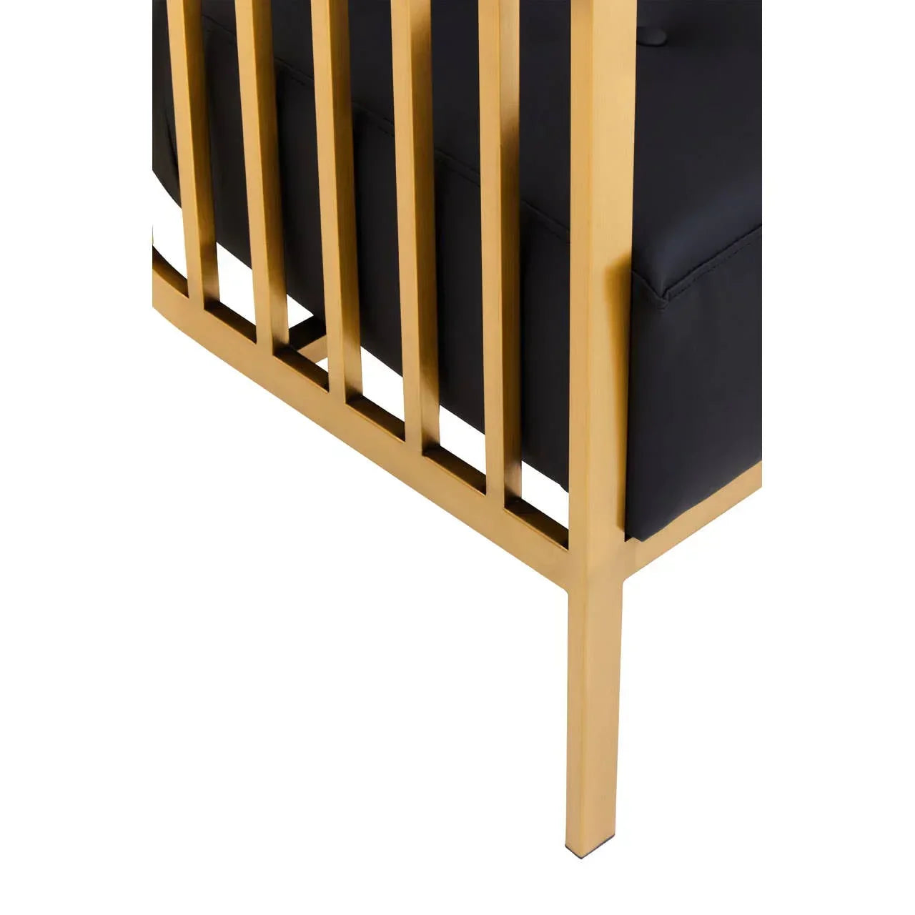 Gold metal sofa leg and slatted arm with black upholstered cushion detail