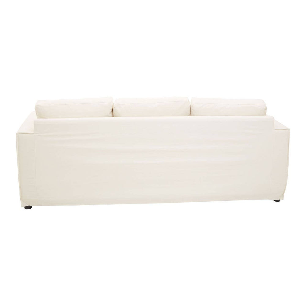 Three-seat cream sofa with a sleek design, featuring a smooth fabric upholstery and three cushioned backrests. The sofa has a minimalist style with a straight, low-profile silhouette and subtle stitching details. It rests on short, sturdy legs