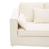 Cream-colored three-seat sofa with a modern design, featuring plush cushions and a minimalist frame. The sofa has a clean, smooth surface and includes a decorative pillow on one side, showcasing a contemporary style suitable for various interior settings