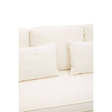 Cream-colored three-seat sofa with plush cushions and a smooth fabric finish, featuring two large back cushions and two smaller decorative pillows. The sofa has a modern design and a clean, minimalist aesthetic
