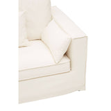 Cream-colored three-seat sofa with a modern design, featuring plush cushions and clean lines. The armrest is square and sturdy, complementing the overall minimalist aesthetic