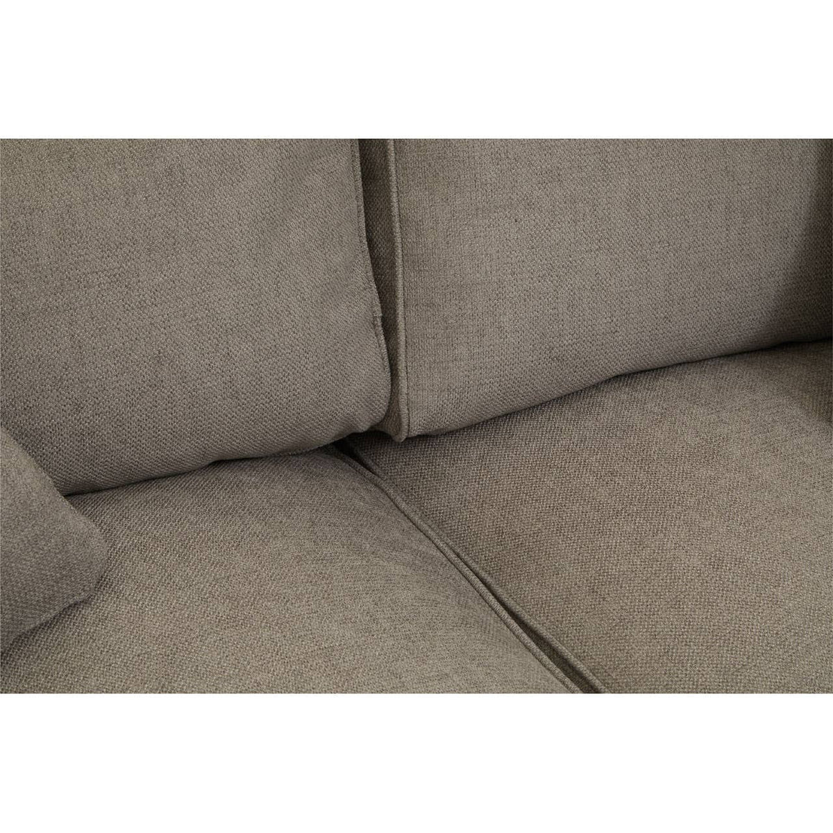 Close-up view of the Valensole 2 Seat Grey Sofa, highlighting the soft, textured fabric and the plush cushions that provide comfort. The neutral grey color complements various interior styles, and the seams are neatly finished, showcasing quality craftsmanship