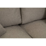 Close-up view of the Valensole 2 Seat Grey Sofa, highlighting the soft, textured fabric and the plush cushions that provide comfort. The neutral grey color complements various interior styles, and the seams are neatly finished, showcasing quality craftsmanship