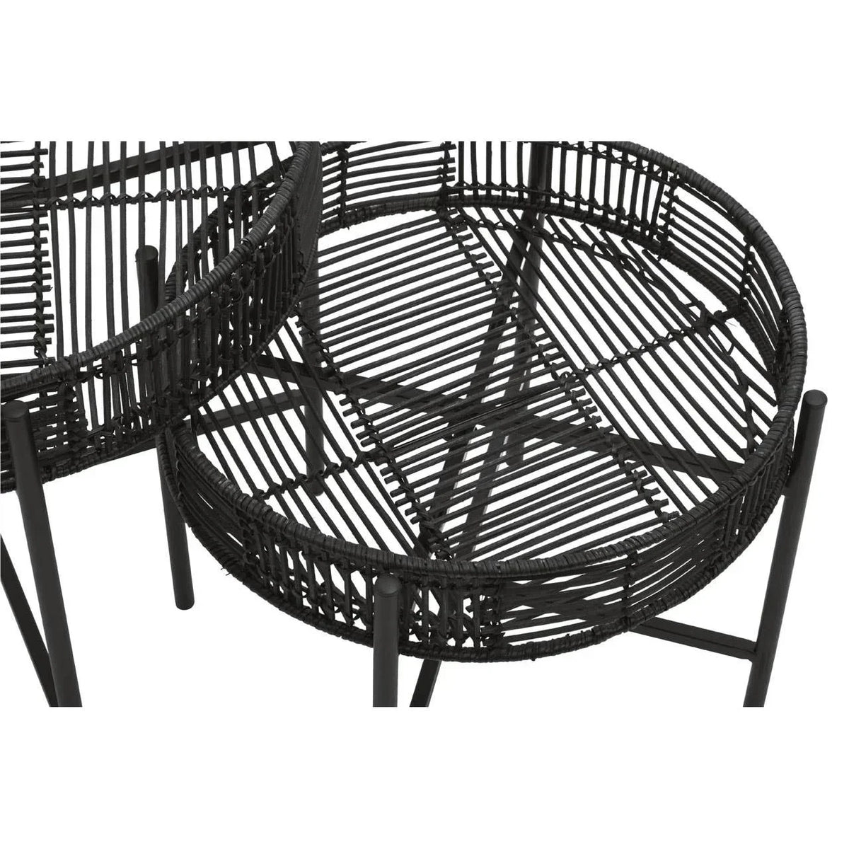 Black rattan accent tables with round tops and metal legs, close-up woven detail