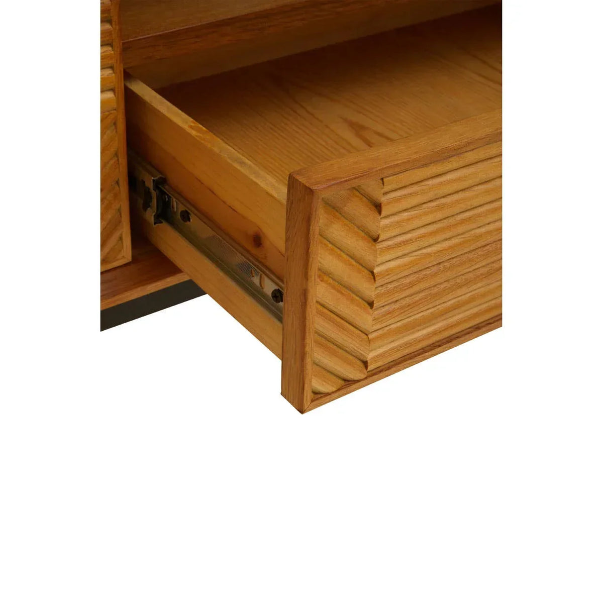 Close-up of wooden drawer with chevron pattern front and metal rail