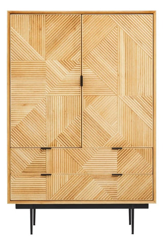 Natural wood cabinet featuring a geometric pattern on the front, two doors with a central handle, and two drawers at the bottom. The cabinet stands on four slender black legs, showcasing a modern design