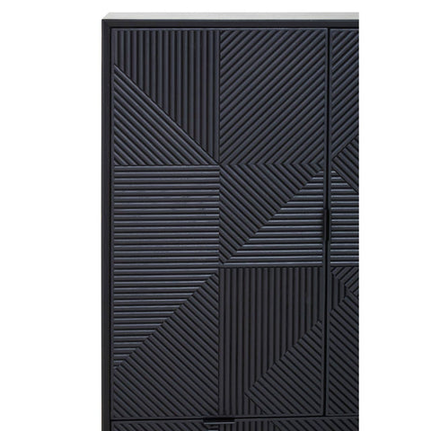 A tall cabinet with a sleek black finish featuring a carved geometric design on the front. The cabinet has a single door with a minimalist handle, providing a modern and stylish look suitable for home decor
