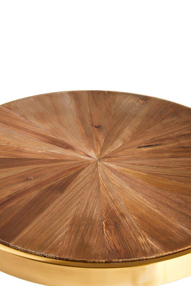 Round wooden coffee table top with sunburst pattern and gold trim close-up