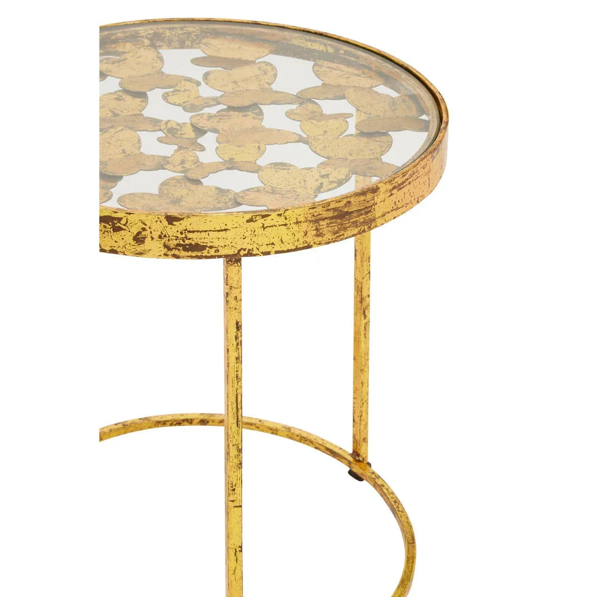 Gold metal side table with round glass top and leaf motif pattern