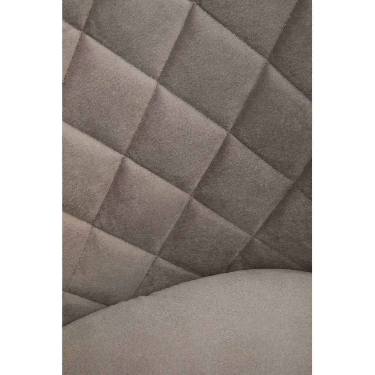 Close up of quilted grey fabric sofa backrest with diamond stitching detail