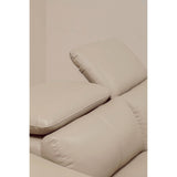 Light beige leather sofa with three seats, featuring adjustable headrests that are slightly reclined. The texture of the leather is smooth, and the overall design is modern and minimalist. The background is a neutral color, enhancing the sofa's elegant appearance