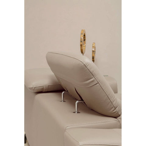 A close-up view of a stone leather sofa featuring adjustable headrests, showcasing the soft, plush texture of the upholstery and the sleek metal supports for the headrests. The background is a neutral color, enhancing the sofa's elegant design