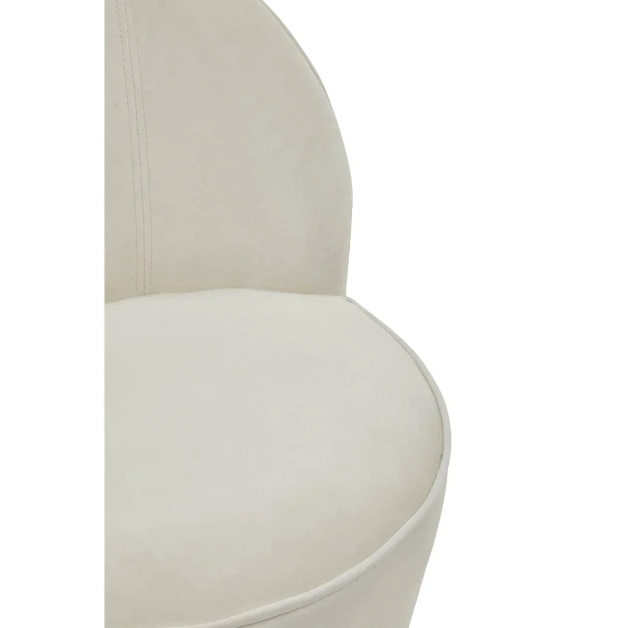 Closeup of cream upholstered chair seat and curved backrest
