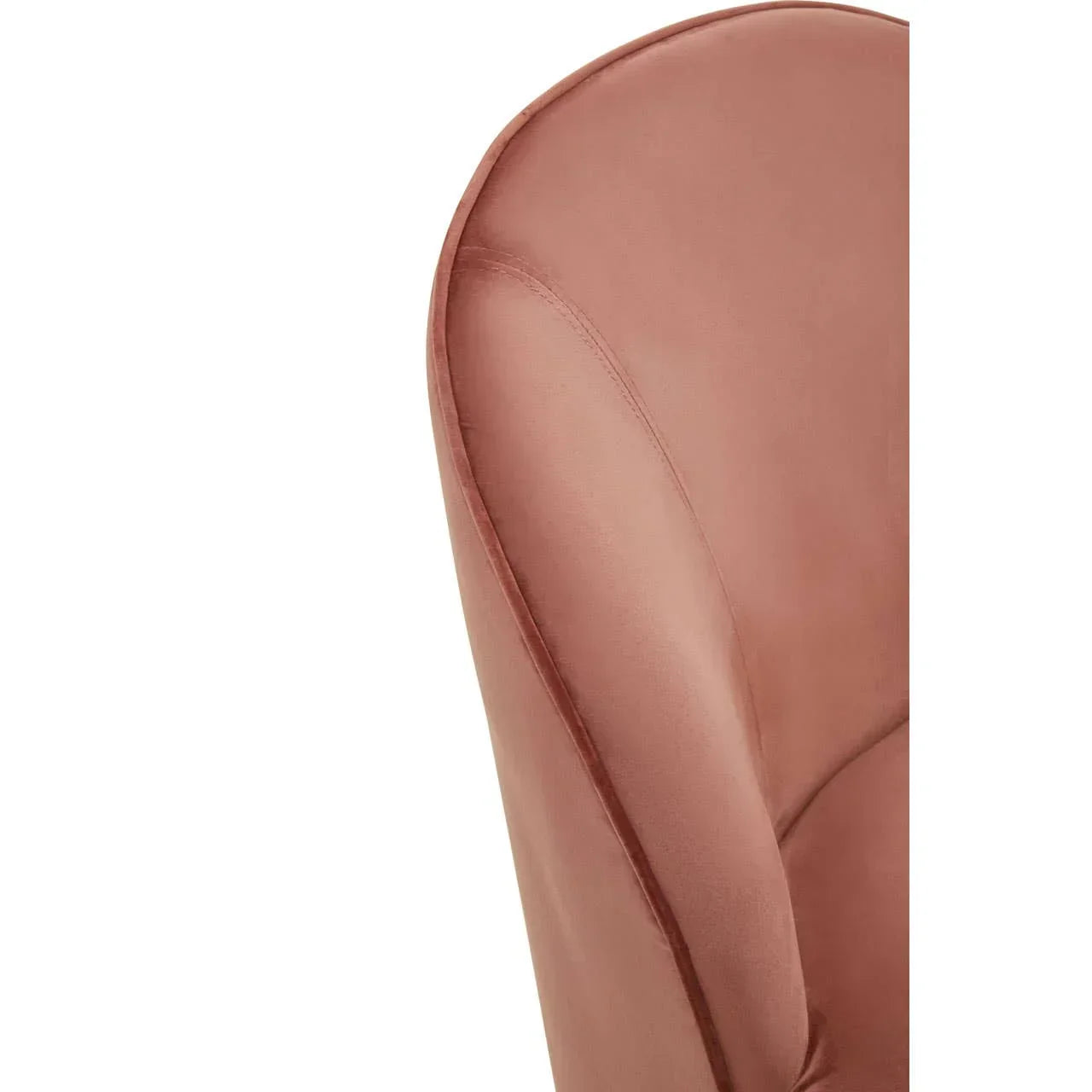 Close view of pink velvet chair backrest with seam detail