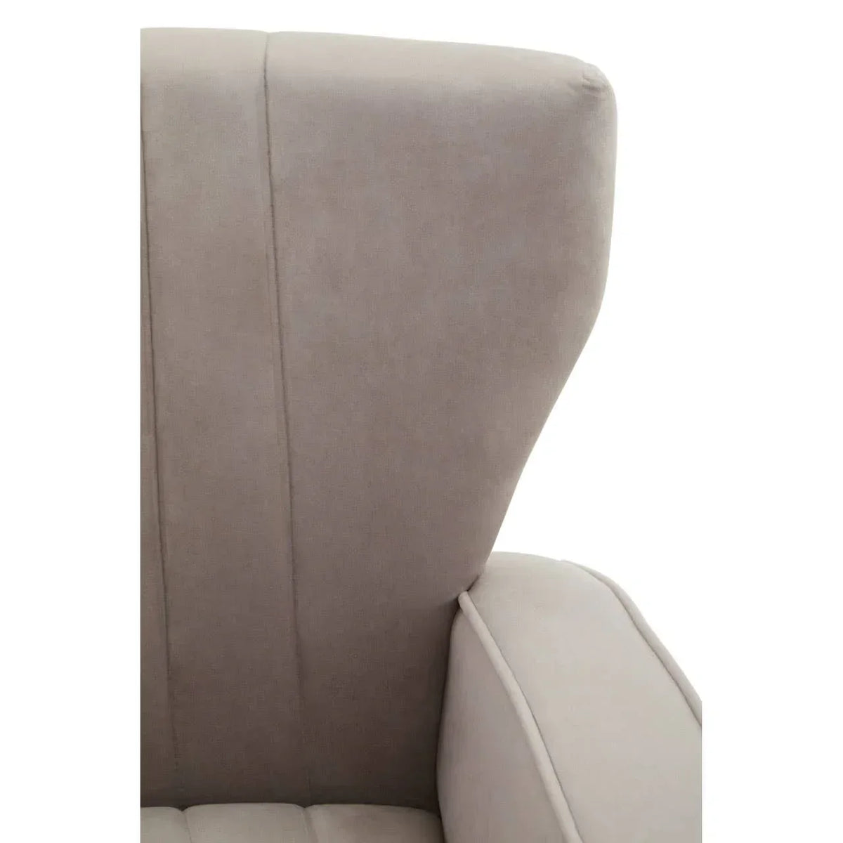 Close-up of beige fabric armchair with high backrest and piped edge detailing