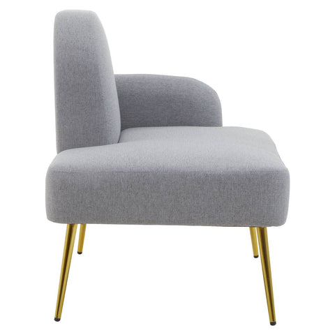 Heather grey chaise longue with a high back and a single armrest, featuring sleek gold metal legs. The upholstery has a soft texture, and the overall design is modern and minimalist