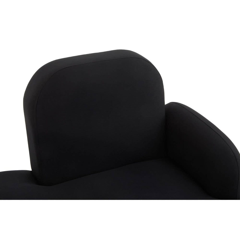 A close-up view of the Heather Black Right Hand Chaise Longue, showcasing the soft, textured black upholstery and the rounded backrest design. The chaise features a sleek, modern silhouette with a low profile and a comfortable armrest