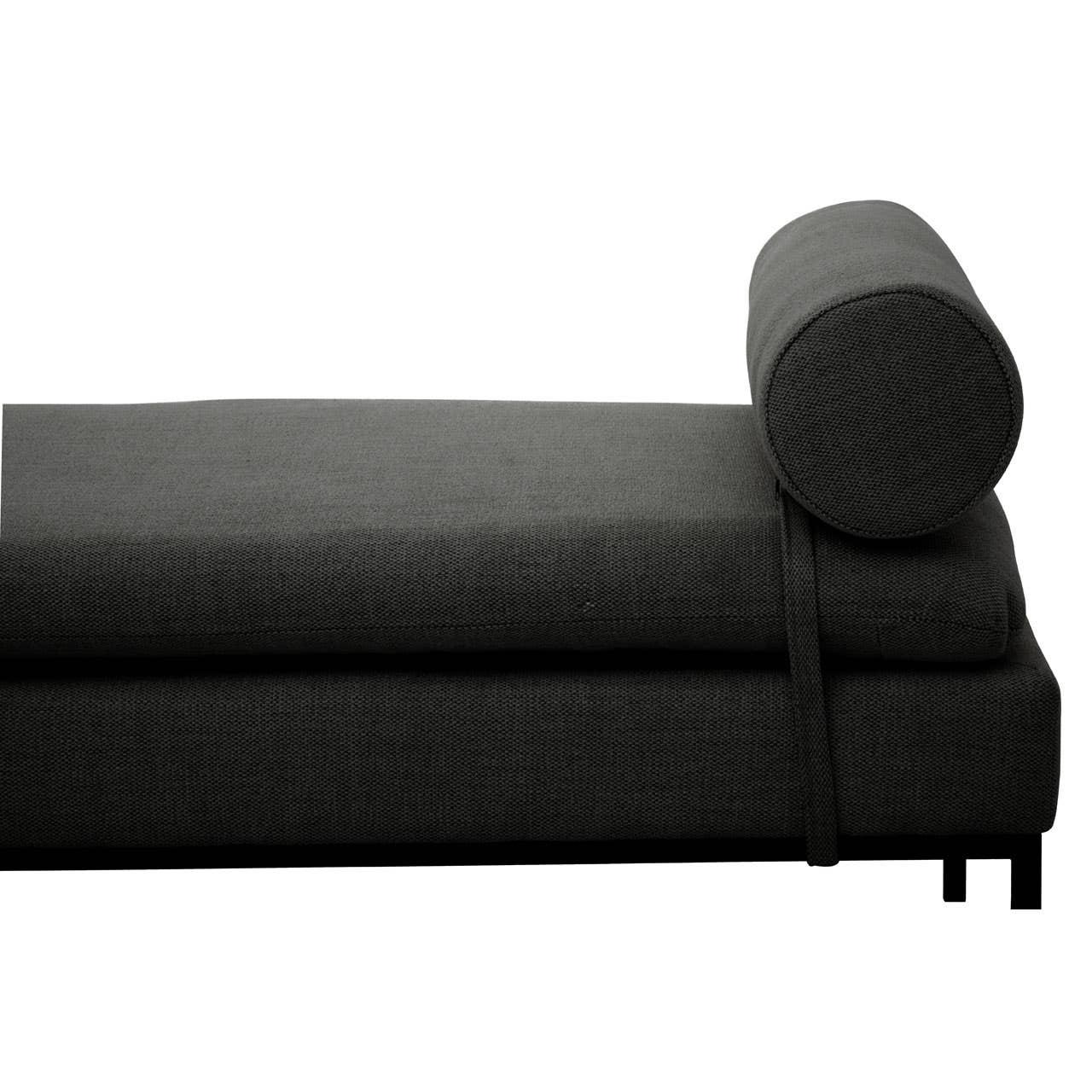 Dark grey chaise lounge with cylindrical bolster cushion and metal legs, side view