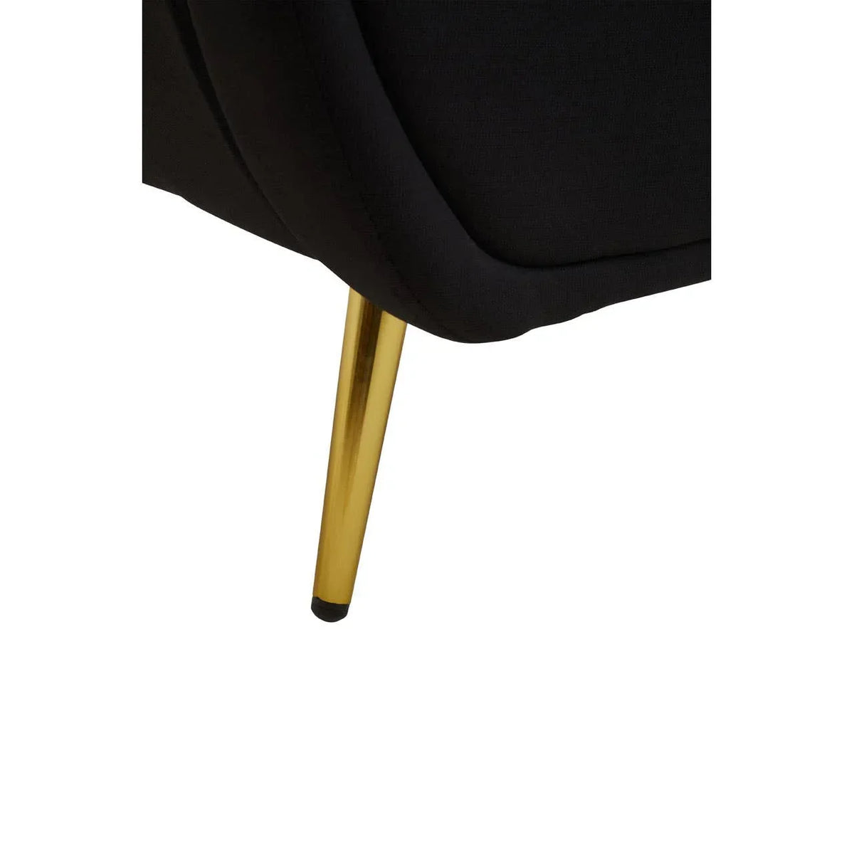 Black sofa with slim gold metal leg upholstered in fabric, close-up corner view