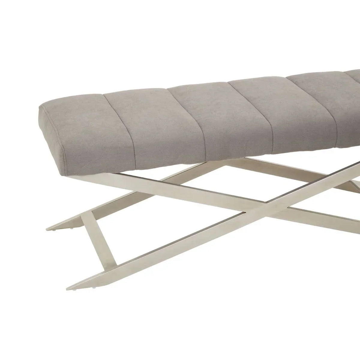 Grey upholstered bench with metal cross legs, side angle view