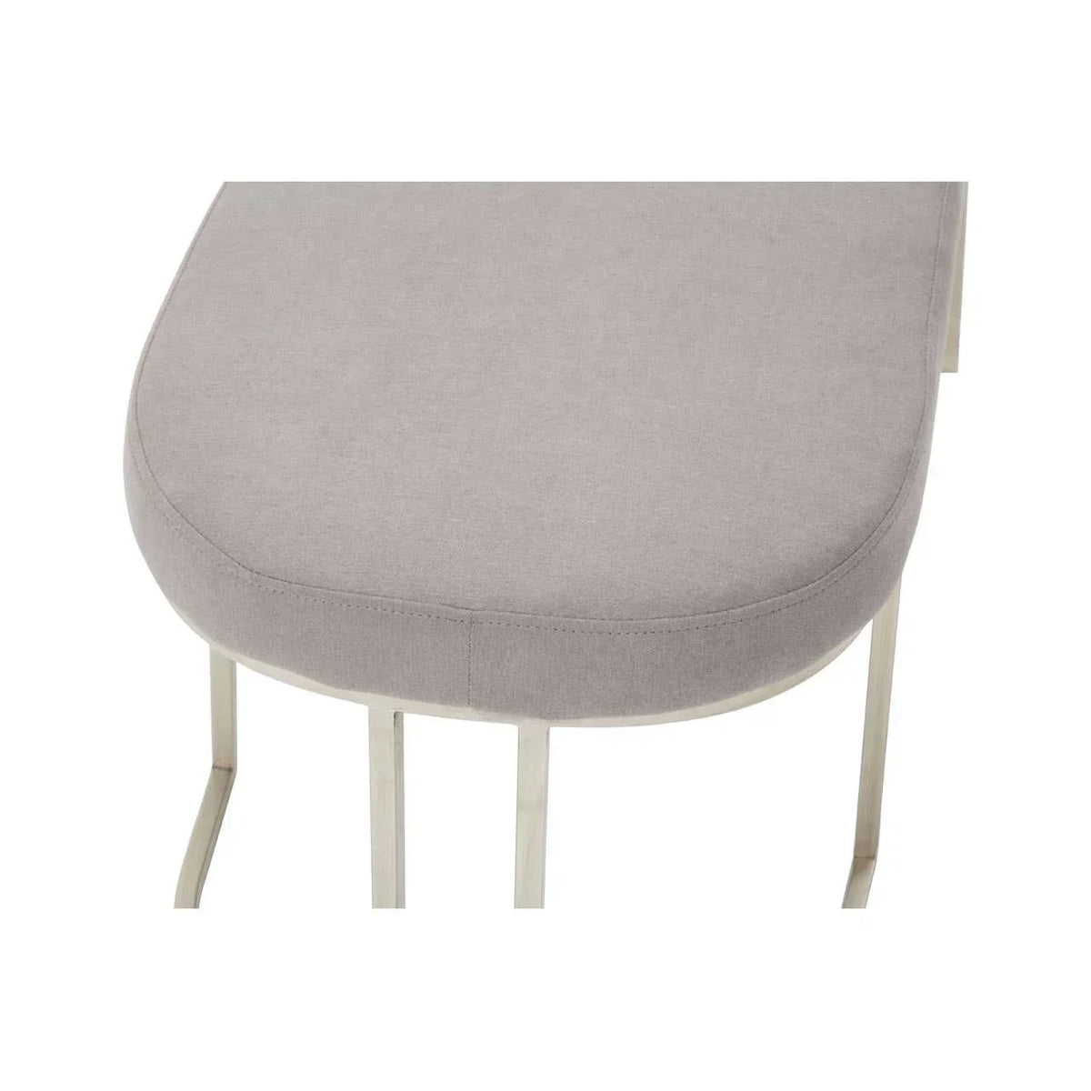 Grey upholstered dining chair seat with chrome legs, angled view