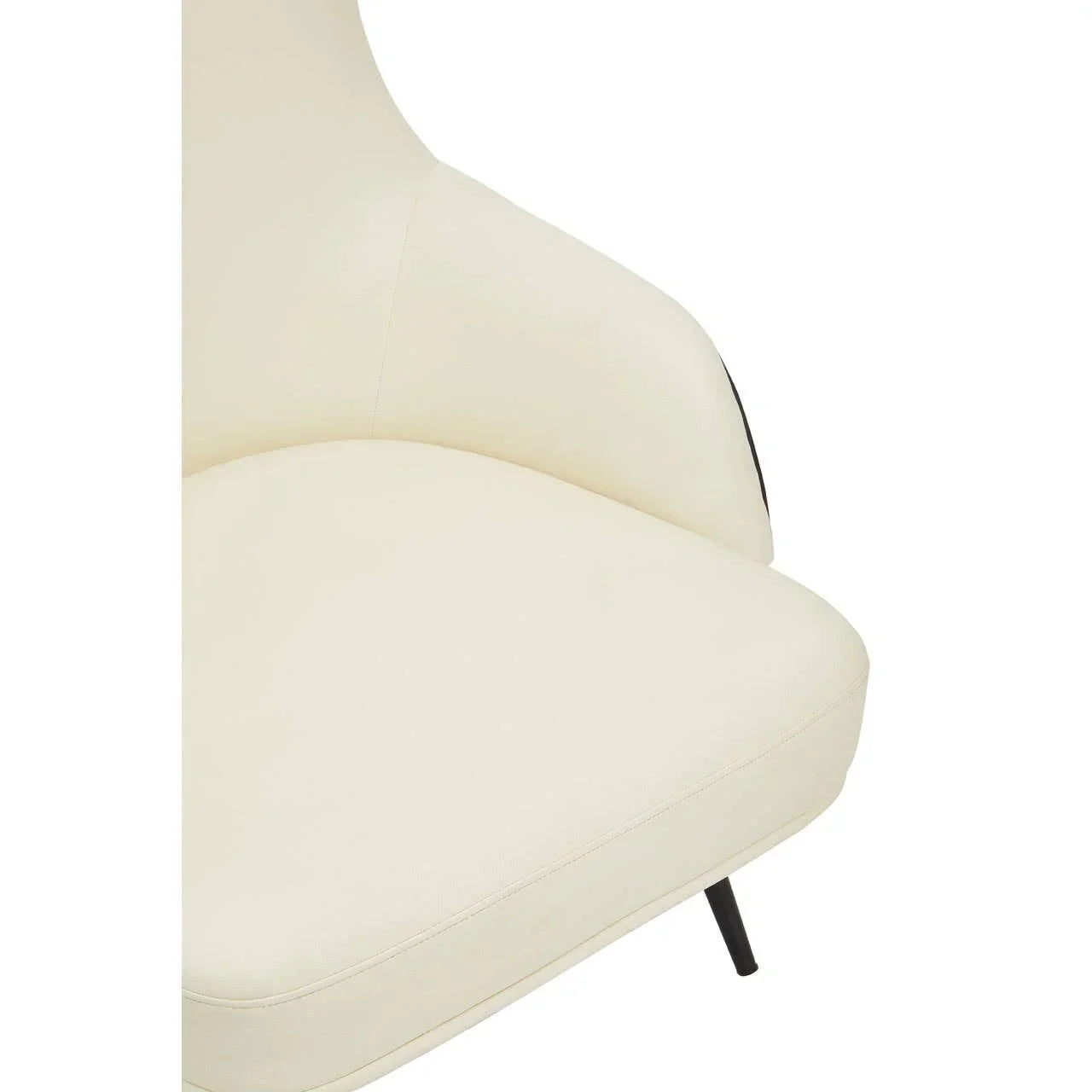 Close-up of cream accent chair seat with curved backrest and black metal leg