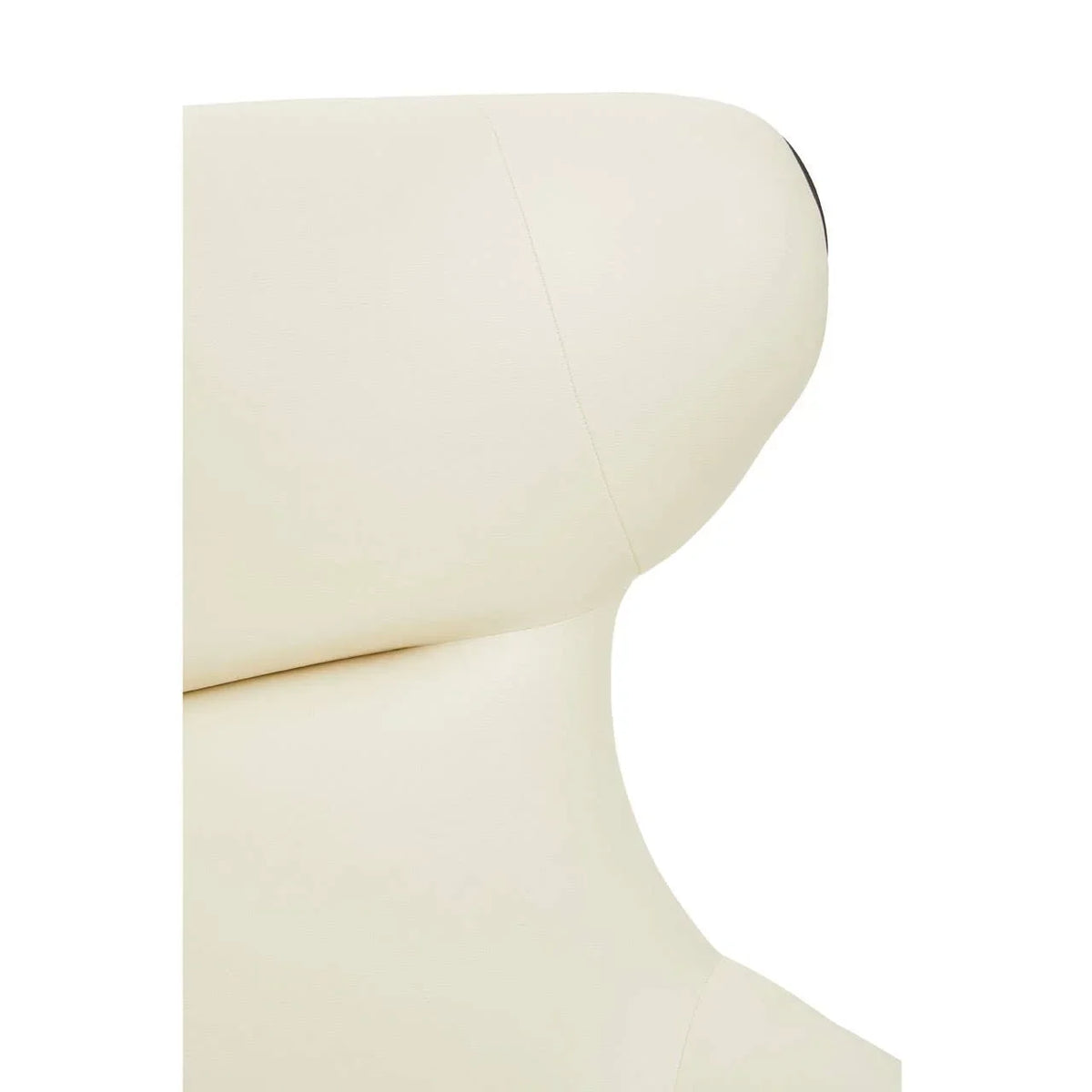 Closeup of cream leather armchair backrest and headrest stitching detail