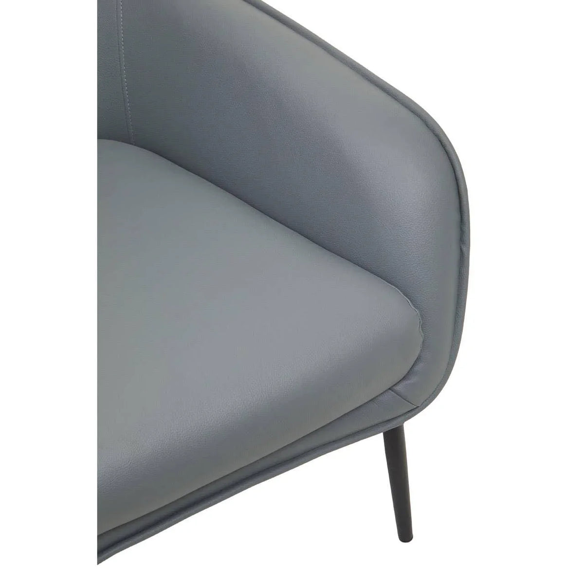 Close-up of grey faux leather armchair with black metal legs