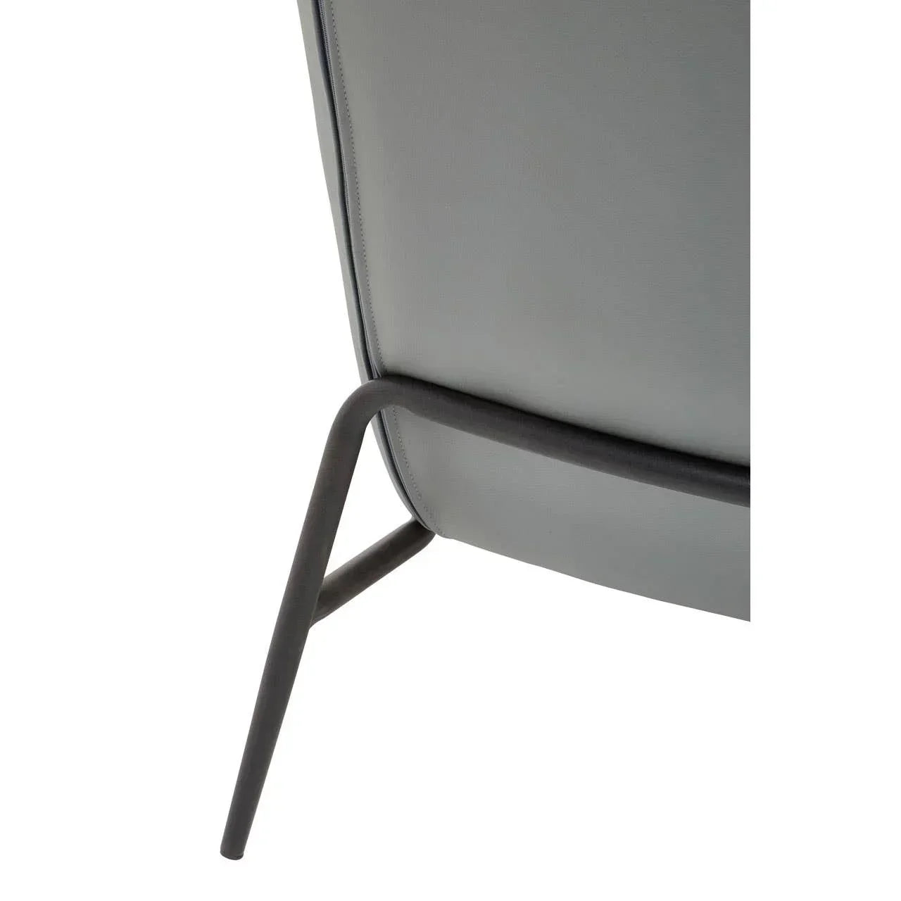 Grey chair back with metal frame detail and angled leg