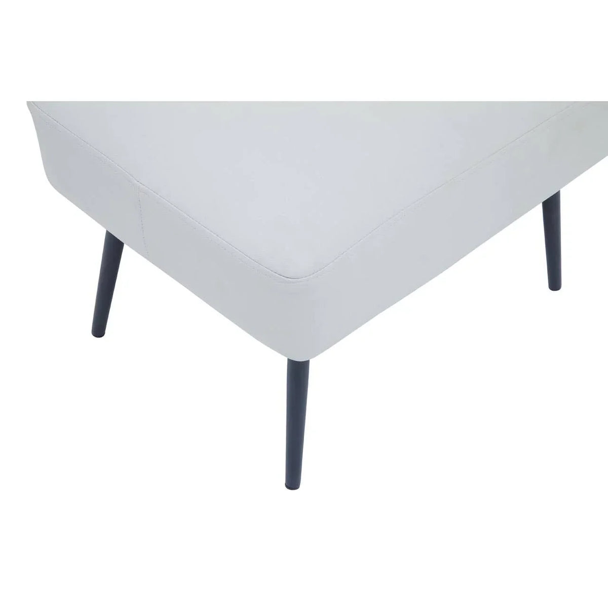 Light grey upholstered bench with slim black metal legs, partial side view