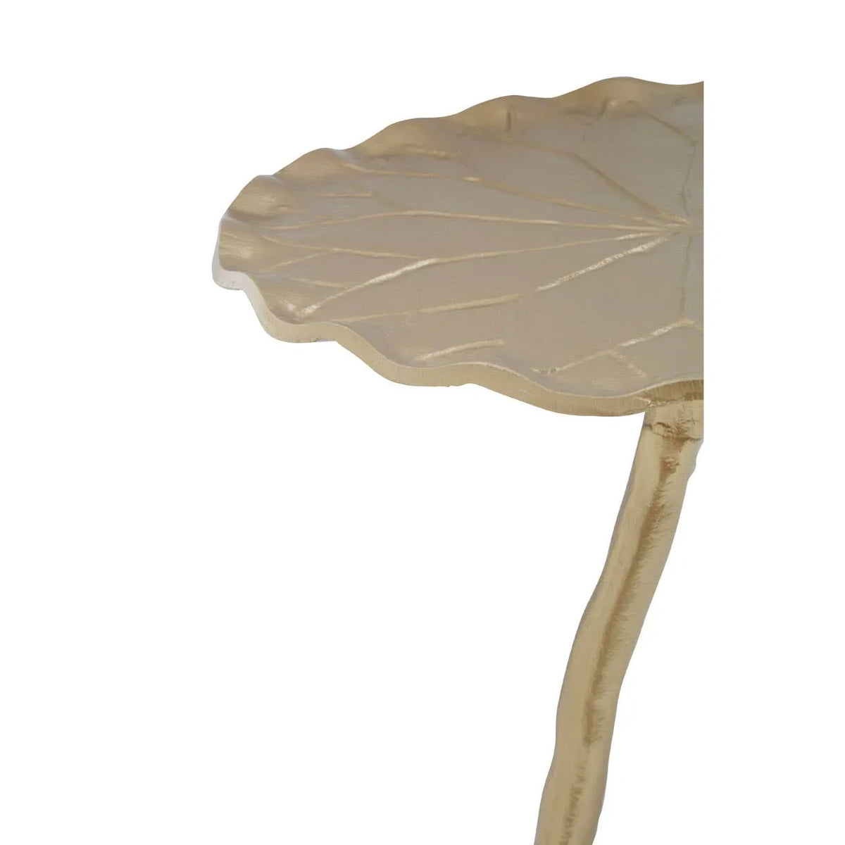 Gold metal side table with leaf-shaped top and textured surface, close-up view