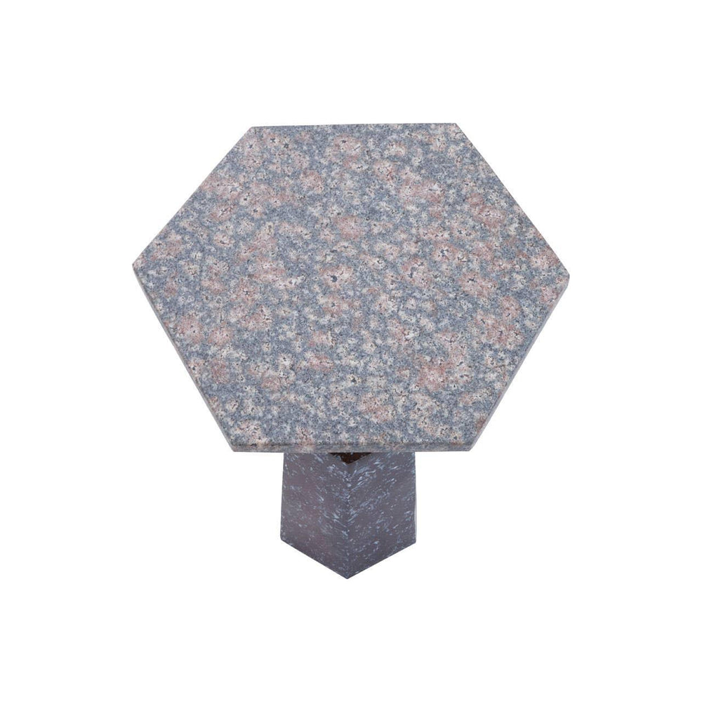 Hexagonal granite side table with speckled surface and geometric pedestal base
