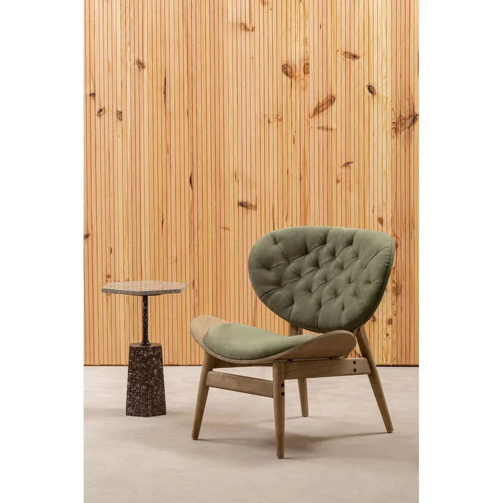 Green upholstered accent chair with wooden frame beside small round side table