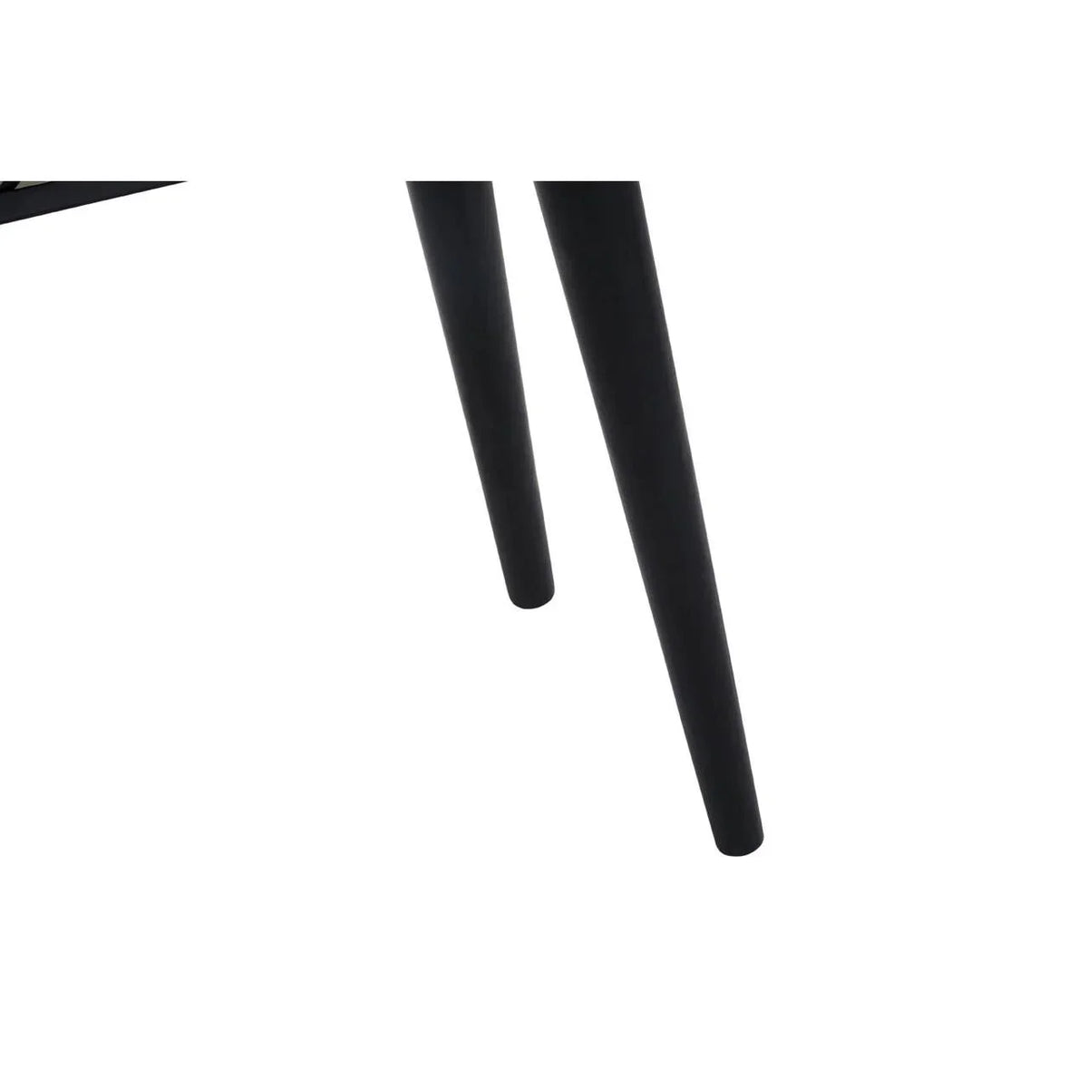 Close-up of black tapered furniture legs with matte finish
