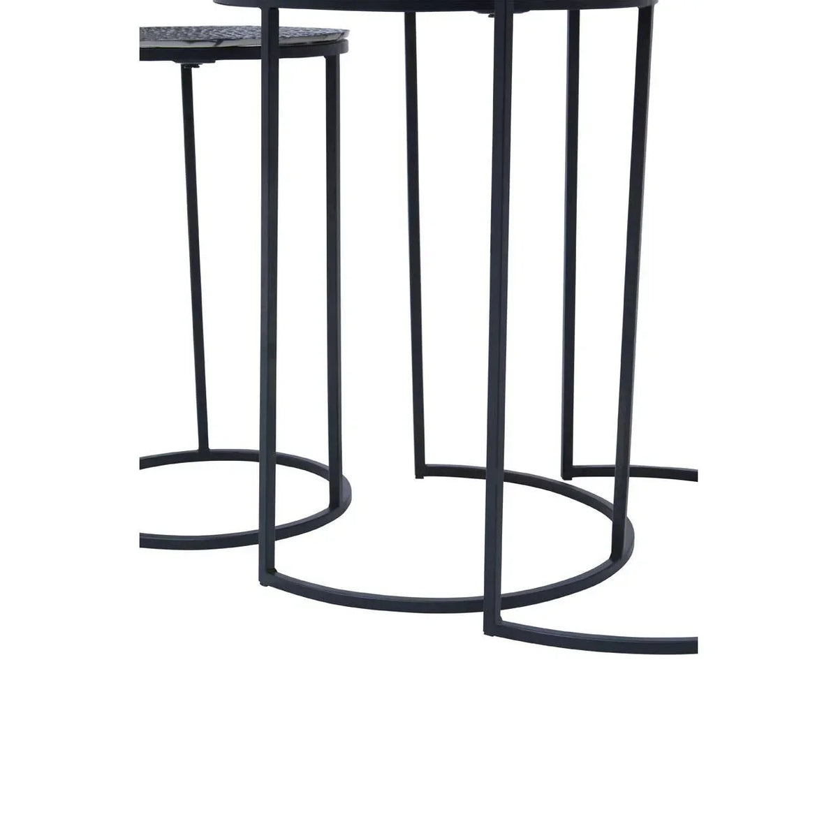 Black metal side table set with circular base and thin legs, partial close-up view