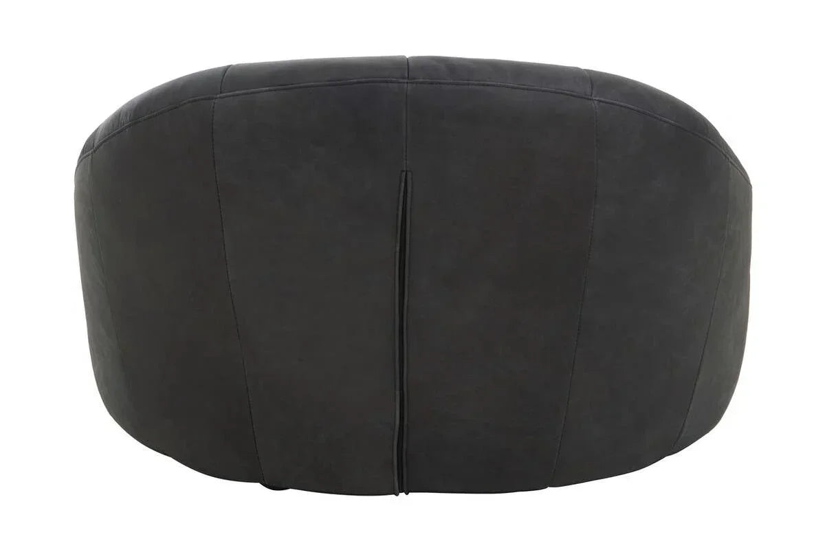 Back view of modern dark fabric armchair with curved design