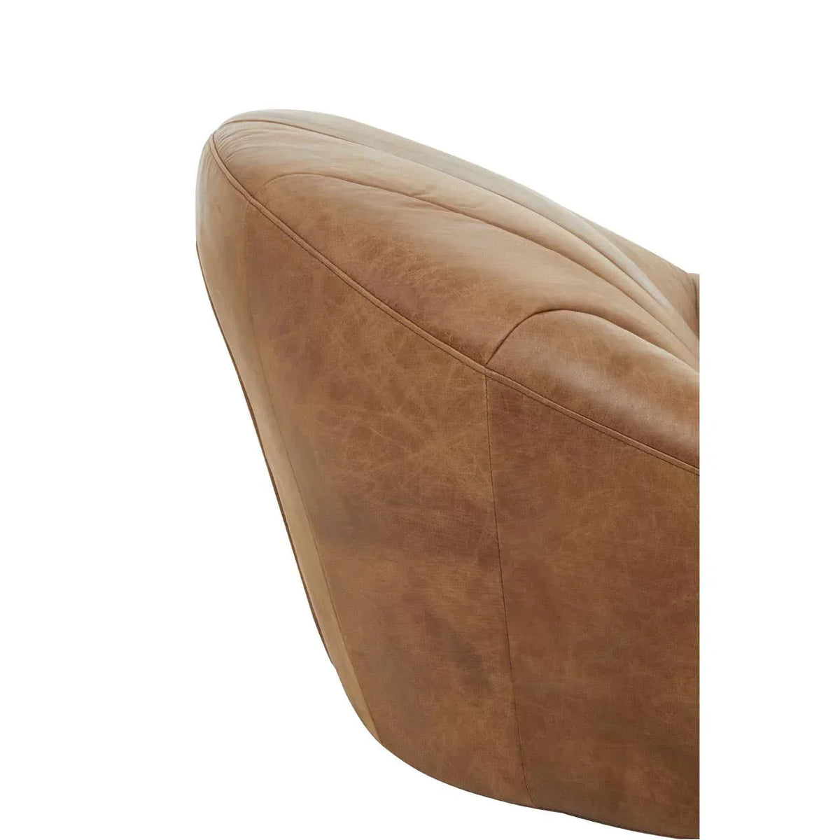 Close up of brown leather sofa armrest with stitched detailing